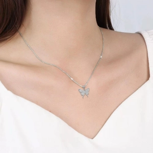 Elegant silver butterfly necklace for women with sparkling zircons on a delicate chain