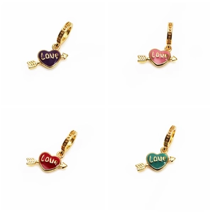 Detail view of heart-shaped gold-plated charms with LOVE engraving in four enamel colors