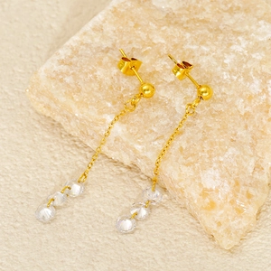 Boucles d'oreilles pendantes en acier doré avec perles de zircon sur pierre de cristal