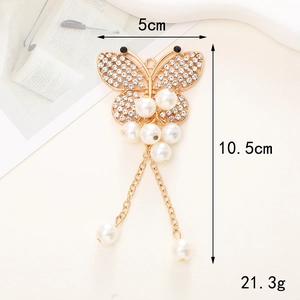 Elegante ciondolo a farfalla dorato con perle e strass, dimensioni 10,5x5cm peso 21,3g