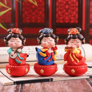 Chinese Tang Dynasty style tumbler figurines of musicians on traditional red bases