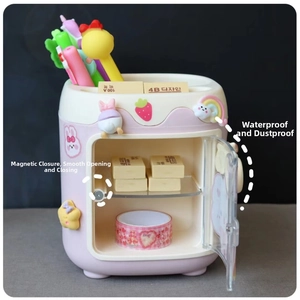 Pink fridge-shaped stationery holder with magnetic transparent door and pencil slots