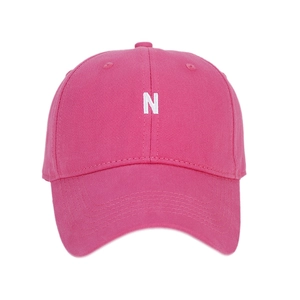 Pink minimalist baseball cap with white N letter embroidery and soft top cotton fabric