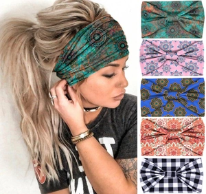 Detail view of five bohemian mandala print headbands showing various colors and patterns