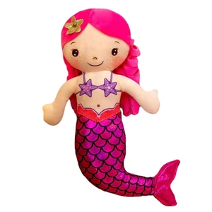 Pink mermaid plush doll with sparkling fish tail and bright hair on white background