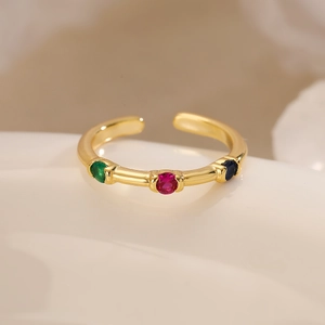 Minimalist gold-plated open ring featuring three colorful cubic zirconia stones
