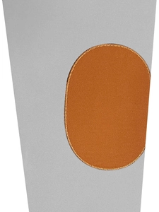Close-up of the vintage sweatshirt featuring a brown elbow patch with detailed embroidery