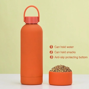 Orange stainless steel insulated water bottle with integrated snack storage and handle