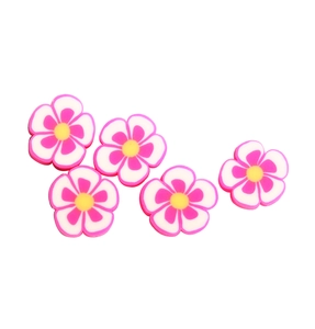 Detailed top view of 10mm flower-shaped polymer clay beads for DIY jewelry making