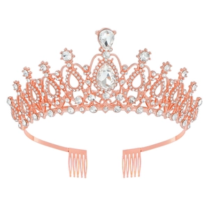 Macro shot of rose gold bridal tiara featuring pear-cut rhinestones and side combs