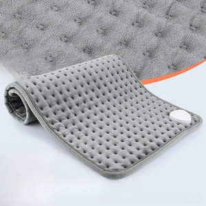 Macro shot of dark grey heating pad showing super soft microfiber fabric and power port