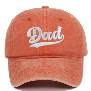 Detail of vintage orange washed baseball cap featuring white Dad 3D embroidery