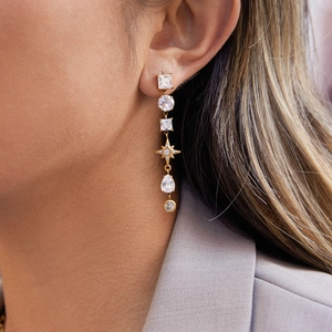 Elegant gold stainless steel tassel earrings with sparkling zircon dangles for women