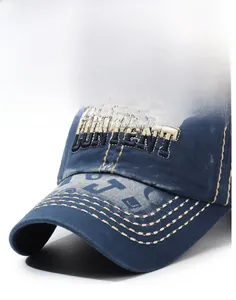 Close-up of vintage washed denim baseball cap with 3D CONTENT embroidery and stitching