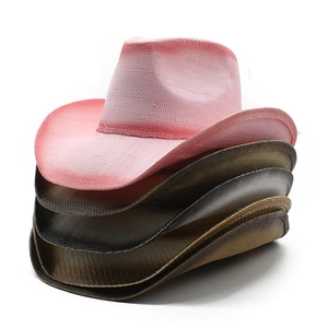 Handcrafted straw cowboy hats in various colors with rolled brims for summer sun protection