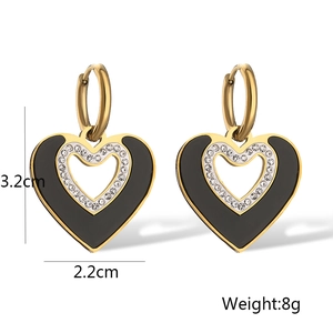 Detail shot of heart drop earrings showing dimensions 3.2cm by 2.2cm with weight info