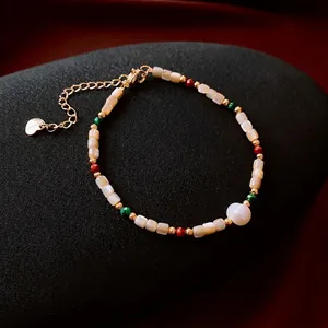 Elegant 18k gold-plated freshwater pearl bracelet with malachite beads and heart charm