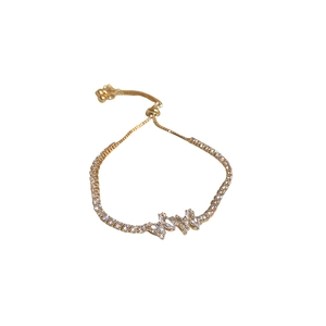 Elegant gold butterfly bracelet with white cubic zirconia and adjustable sliding clasp