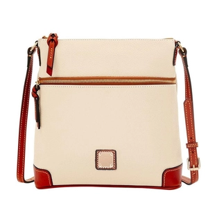 Detail of off-white lychee texture leather crossbody bag with brown leather trim details