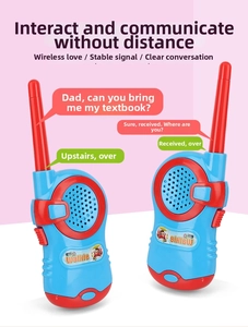 Macro shot of blue and red children's walkie-talkies showing buttons and antenna