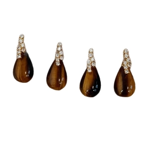 Vintage tiger eye teardrop earrings with silver pins and cubic zirconia in brown hue