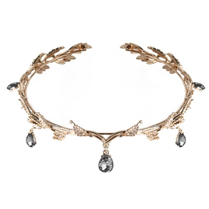 Detailed close-up of golden leaf bridal crown with grey rhinestone teardrop pendants