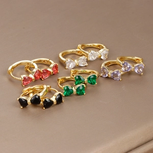 Detail view of five 18K gold-plated bow earrings with multicolor zircon stones