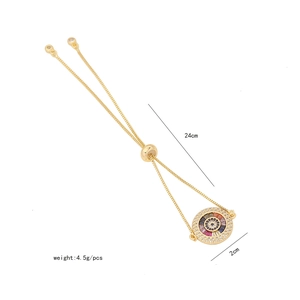 Detail shot of the evil eye pendant bracelet with size specs and micro-set zircons