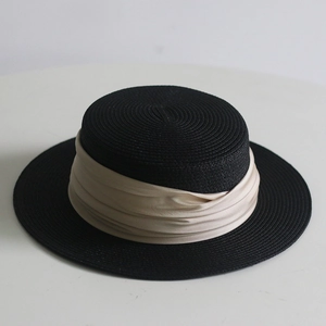 Classic black flat top straw boater hat with elegant beige satin ribbon for summer