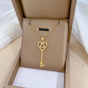 Luxurious gold heart key necklace with crystals in a premium gift box