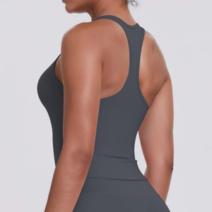 Detail view of charcoal gray racerback sports vest with high-stretch yoga fabric