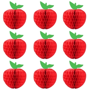 Dettaglio di nove mele in nido d'ape di carta rossa disposte in una griglia 3x3