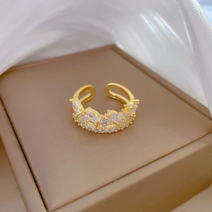 Adjustable gold plated water drop ring featuring double row zircon stone inlay
