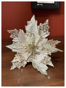 Detailed view of champagne SwanLace Christmas flower with gold sequins and embroidery