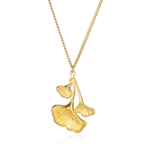 Detailed view of golden ginkgo leaf pendant with realistic vein texture on fine link chain