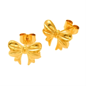 Polished gold stainless steel bow stud earrings presented on a clean white background