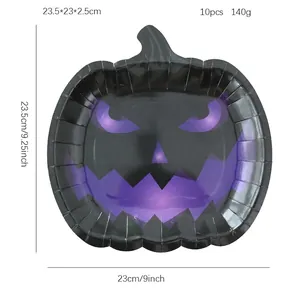 Halloween pumpkin face paper plates in black and purple, 10-piece set for party table decor