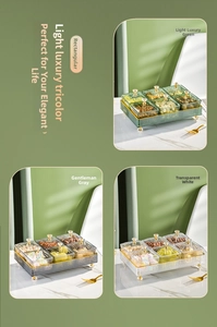 Detail of luxury snack box with six lidded compartments and gold crown handles