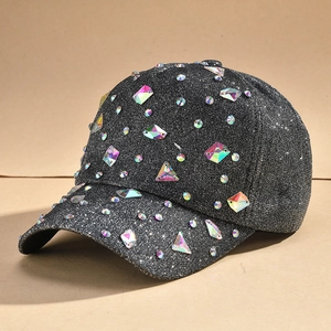 Close-up of sparkling black fabric baseball cap with colorful rhinestones details