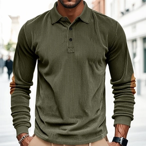 Detail of olive green corduroy polo shirt featuring contrasting brown elbow patches
