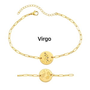 Detail view of 18K gold plated Virgo constellation zodiac pendant on paperclip chain