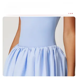Detail of light blue sports dress featuring pleated waist for a slimming contoured fit