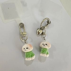 Mini white flocked bichon puppy keychain with green clothes and silver heart pendant