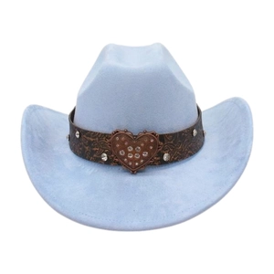 Close-up of heart rhinestone buckle on a light blue faux suede western cowboy hat