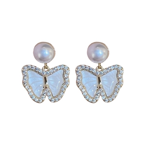 Elegant gold plated butterfly stud earrings with round pearls and shell wings