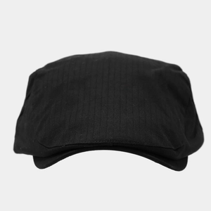 Classic black quick-dry flat cap with fine twill texture in a minimalist vintage style