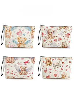 Four pattern display of bear and heart printed canvas makeup bags with zip closure