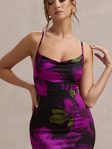 Floral print maxi dress with thin straps and cowl neck on a black background