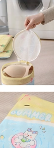 Macro view of fine mesh laundry bag with cute summer kitten print for bra protection