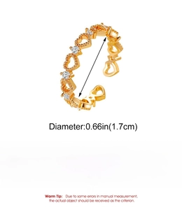 Detail of hollow heart ring showing brass material specs and 1.7cm diameter size